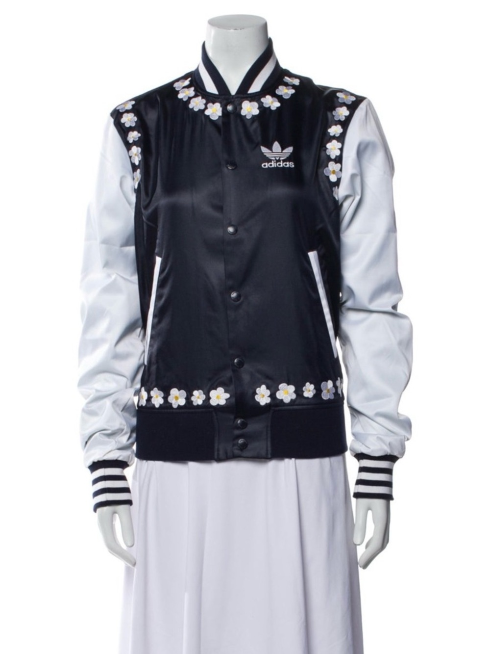 adidas Blue  and White Jacket
It’s a collaboration with Pharrell Williams